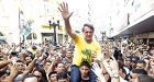 Brazil's far-right presidential candidate survives life-saving surgery after being stabbed