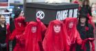 Climate activists protest mass consumerism of Black Friday in Vancouver