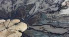Environmental watchdog report says Alberta oilsands tailings ponds are tainting groundwater
