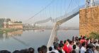 Death toll in India rises to more than 130 in suspension bridge collapse | CBC News