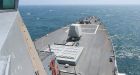 China's military confronts US ship in South China Sea