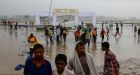 Overcrowding, bad weather may have contributed to deadly stampede in northern India, police say