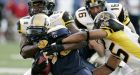 Roberts carries Bombers past Tiger-Cats