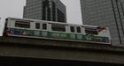 SkyTrain runs between stations with open doors