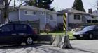 Concrete roadblocks set up in front of gangster homes