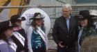 Campbell dons cowboy duds in NDP territory
