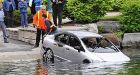 Car engulfed in flames drives into river