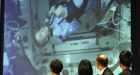 Orbiting astronaut gets honorary degree