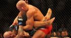 St. Pierre, Lesnar retain titles @ UFC 100