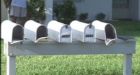 Mailbox kills woman leaning out of car