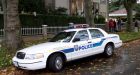 Mounties pay docked for spitting on motorist