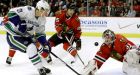 Canucks rally over Blackhawks