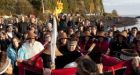 Olympic torch hops north