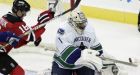 Canucks ward off the Devils