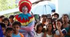Gifts bring cheer to Filipino volcano evacuees