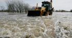 Flood-weary residents leaving homes near Winnipeg