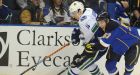 Canucks stun Blues in OT