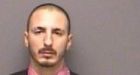 One man arrested, another sought in hospital deathbed theft