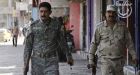 Uniformed gunmen kill 24 Iraqis