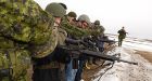 Visitors sample weapons, vehicles at gun camp event