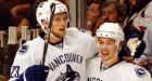 Canucks dominate Blackhawks in series opener