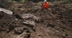 Mud buries Guatemala bus, 2nd slide kills rescuers