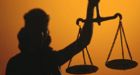 U.S. hunter who says she mistook husband for a bear faces trial in N.L.