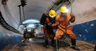China mine blast kills 21; 16 still trapped