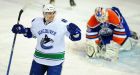 Canucks suffocate Oilers
