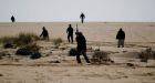 Rebels defeat Gadhafi's forces at key oil port