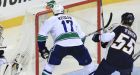 Kesler, Canucks take Game 3 in OT