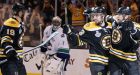 Bruins blank Canucks to even series