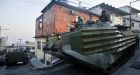 Brazilian soldiers and police raid slums overrun by drug trafficking gangs