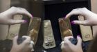 Gold iPhone with engraving of Vladimir Putin's head goes on sale for �2,500