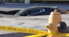 Toronto sinkhole swallows Jaguar